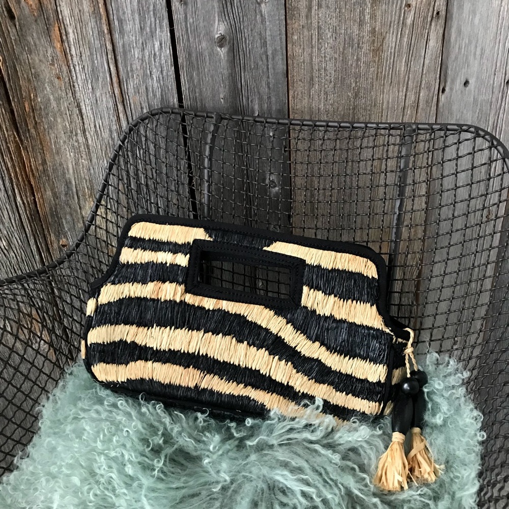 Black and straw clutch